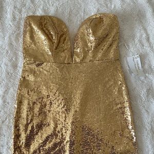 Gold sequined sweetheart dress